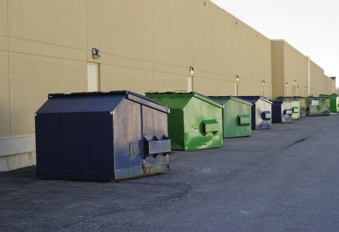 multiple dumpsters equipped for tough construction jobs in Amherst, VA